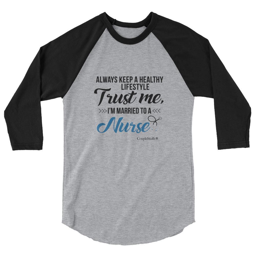 "Original Men's 3/4 Sleeve Raglan Shirt Apparel with caption "I'm Married To A Nurse"